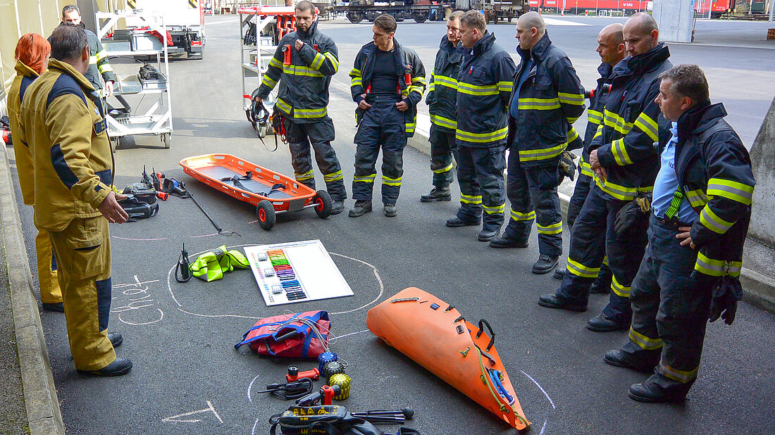 Equipment for tunnel operations Instructors explain the tools for a tunnel fire operation to fellow fire-fighters